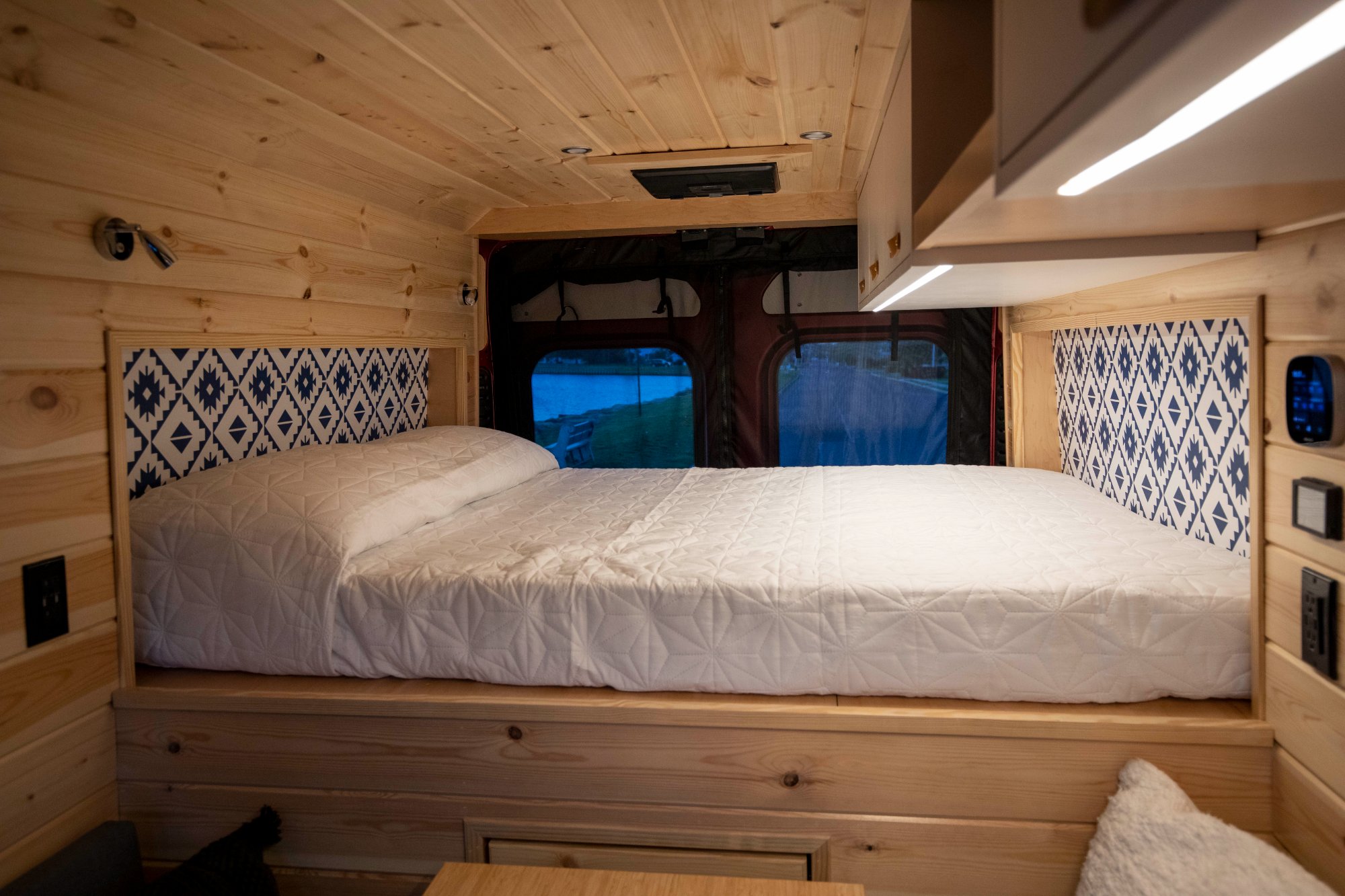 Fixed sleeping platform with full-size mattress