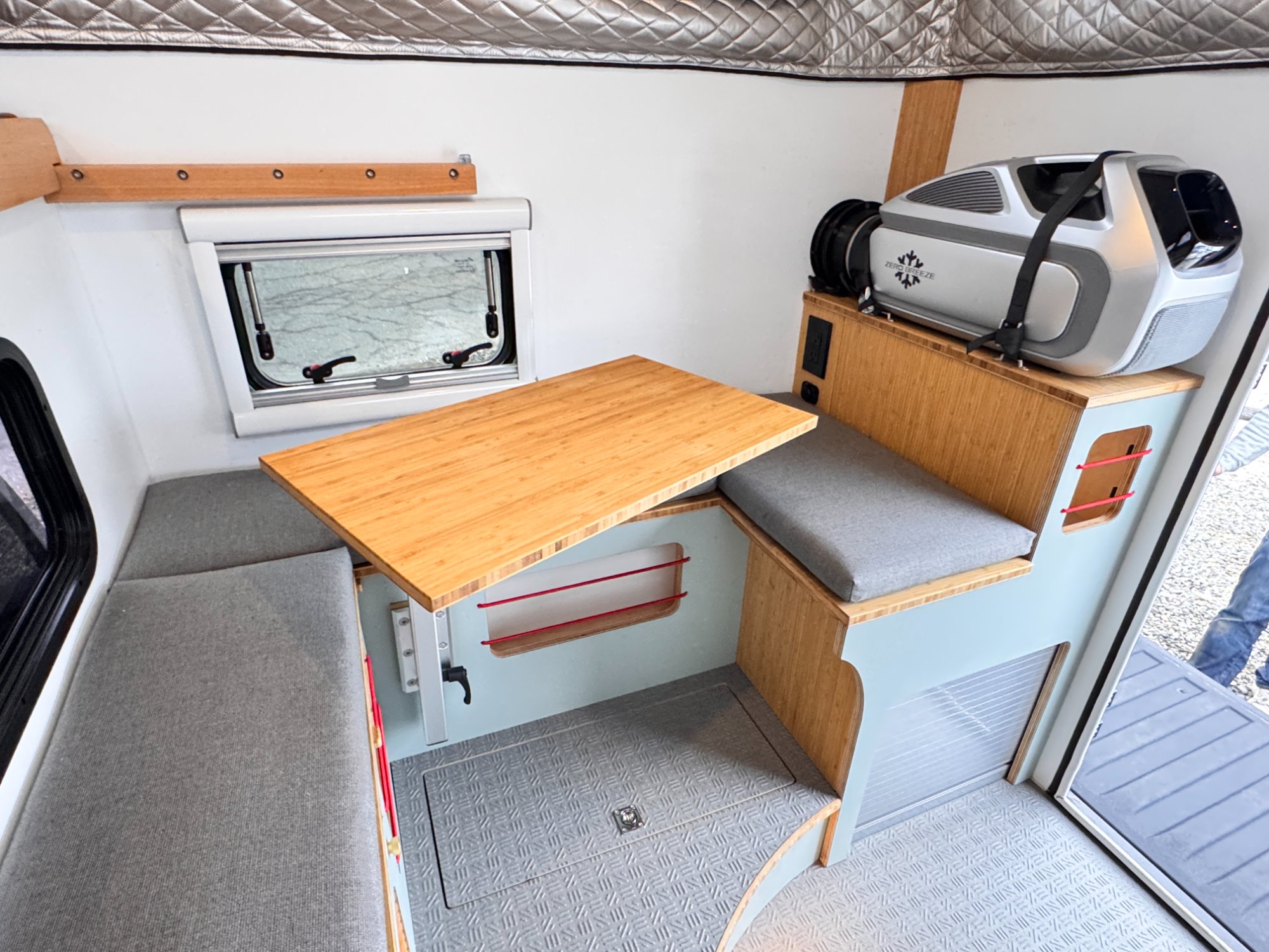 Big Ripper interior — lounge seating and butcher block table