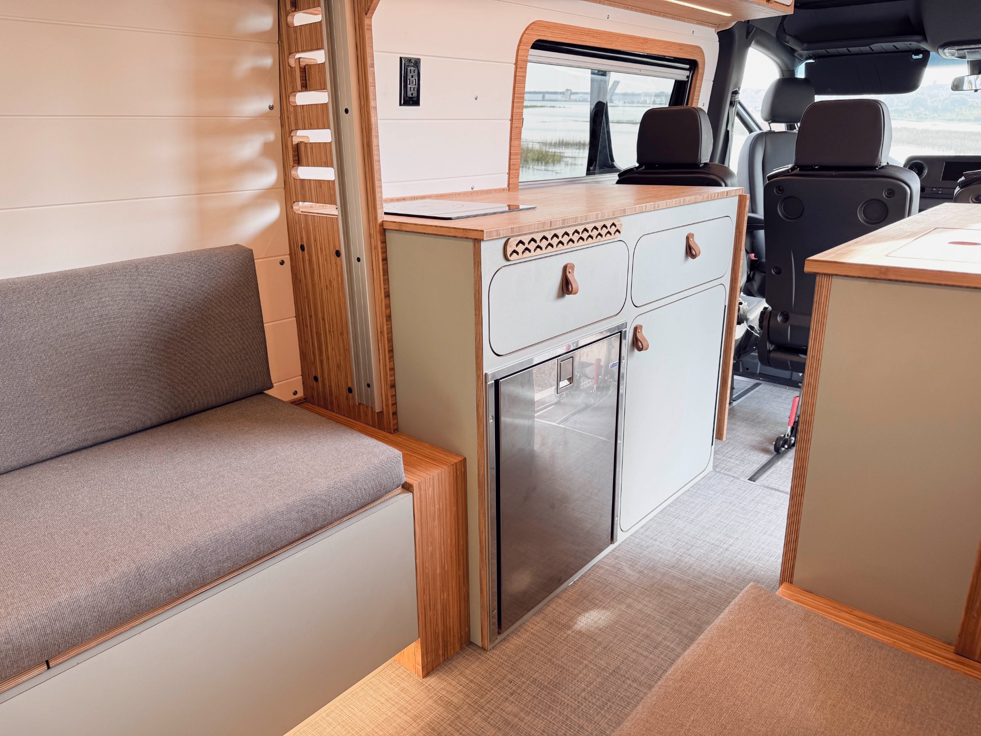 Loft — driver galley with fridge, induction, leather pulls
