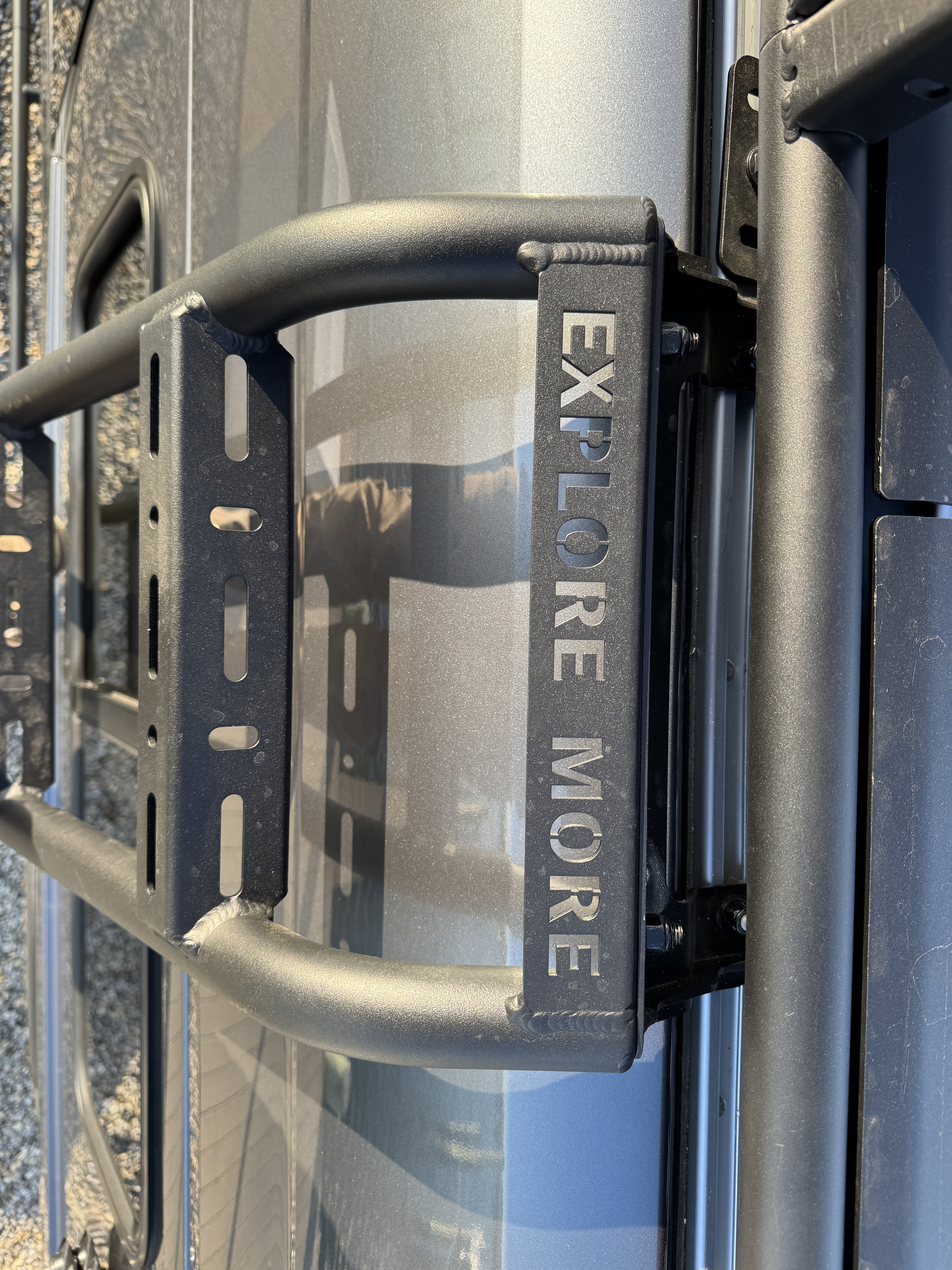 Baja Sprinter 170 4x4 — Aluminess ladder bracket detail engraved EXPLORE MORE