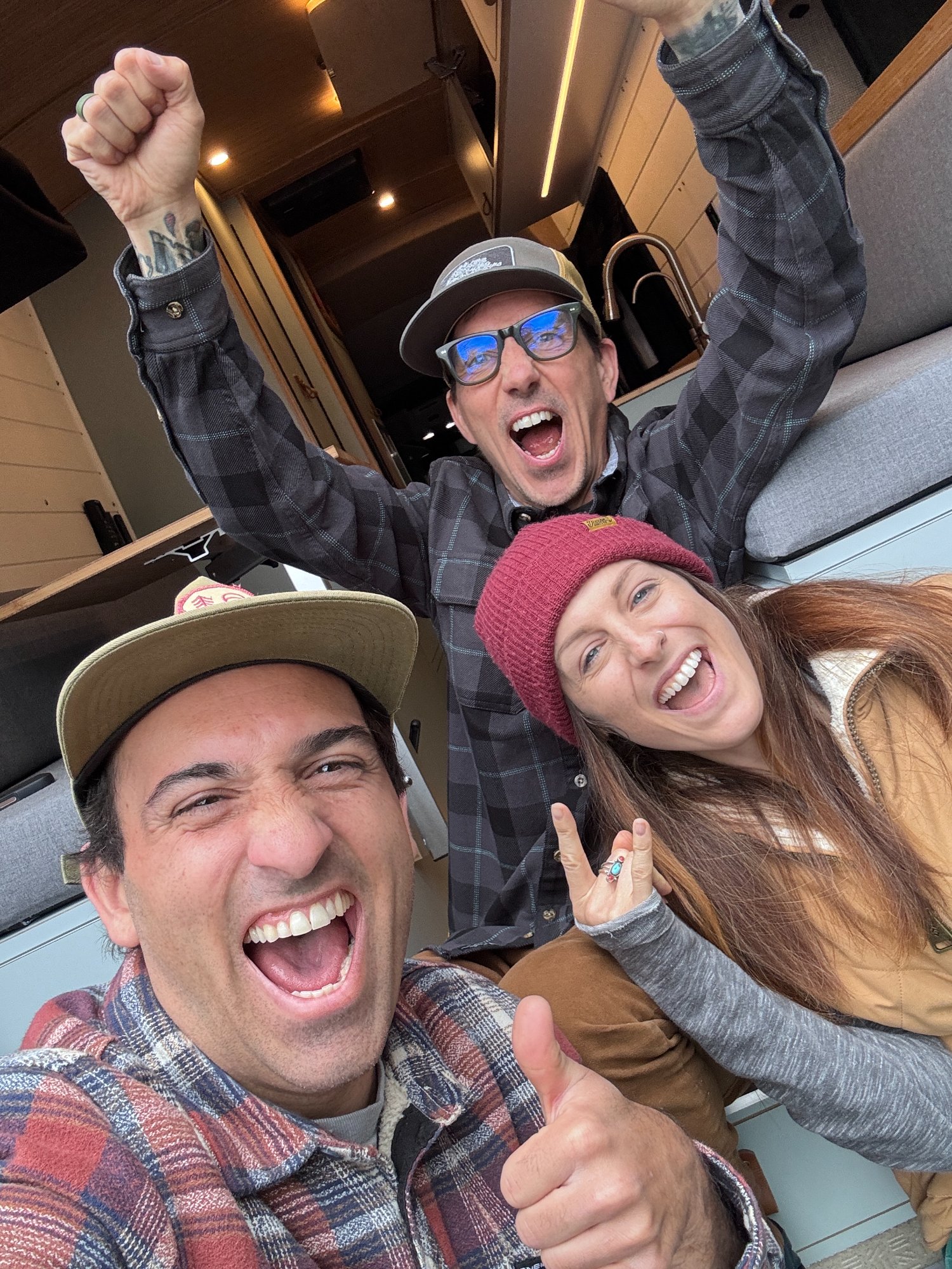 Customer celebrating their finished Sequoia + Salt van delivery