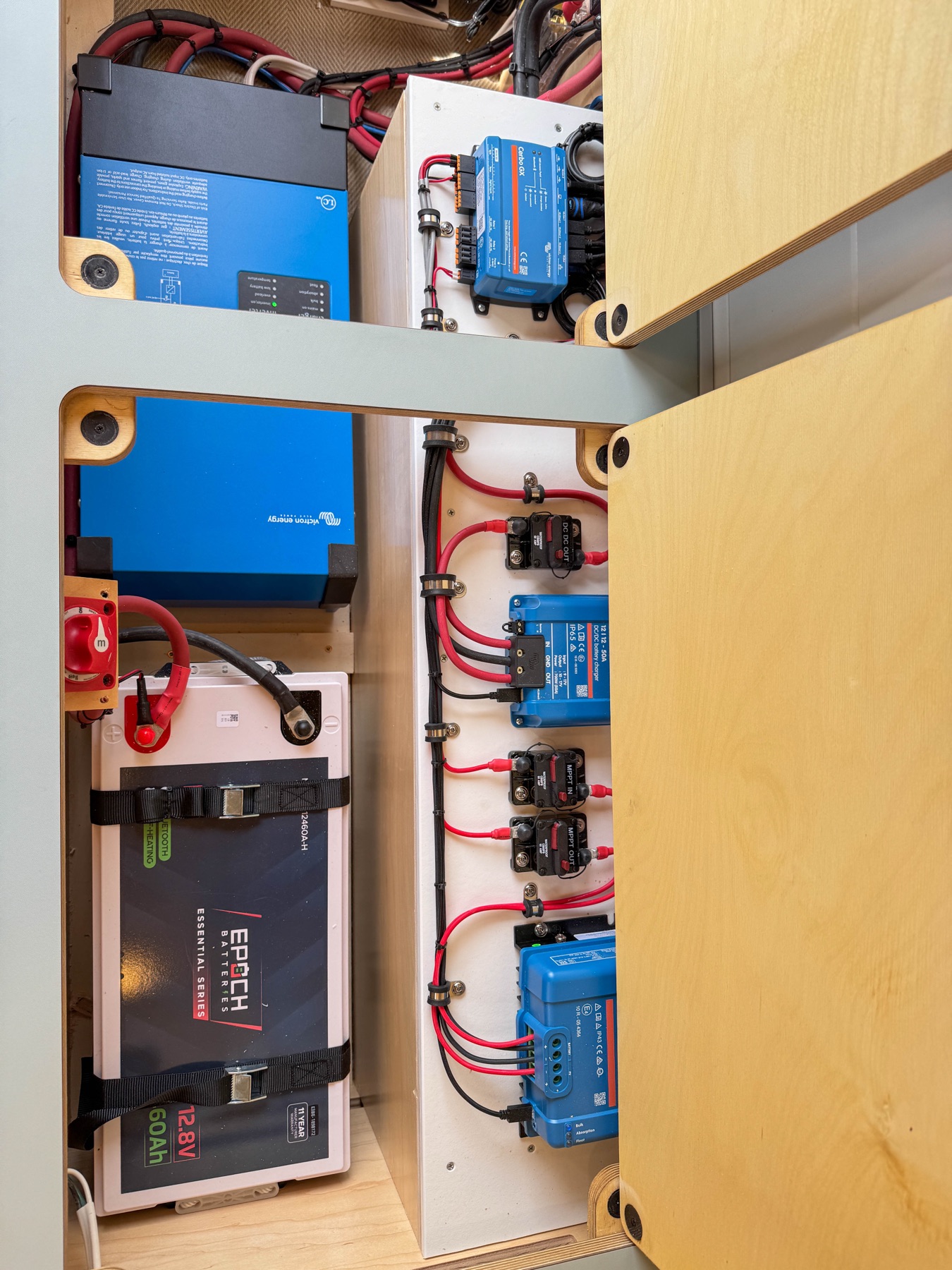 Epoch lithium battery bank with Victron MultiPlus inverter and DC distribution — electrical and power systems work