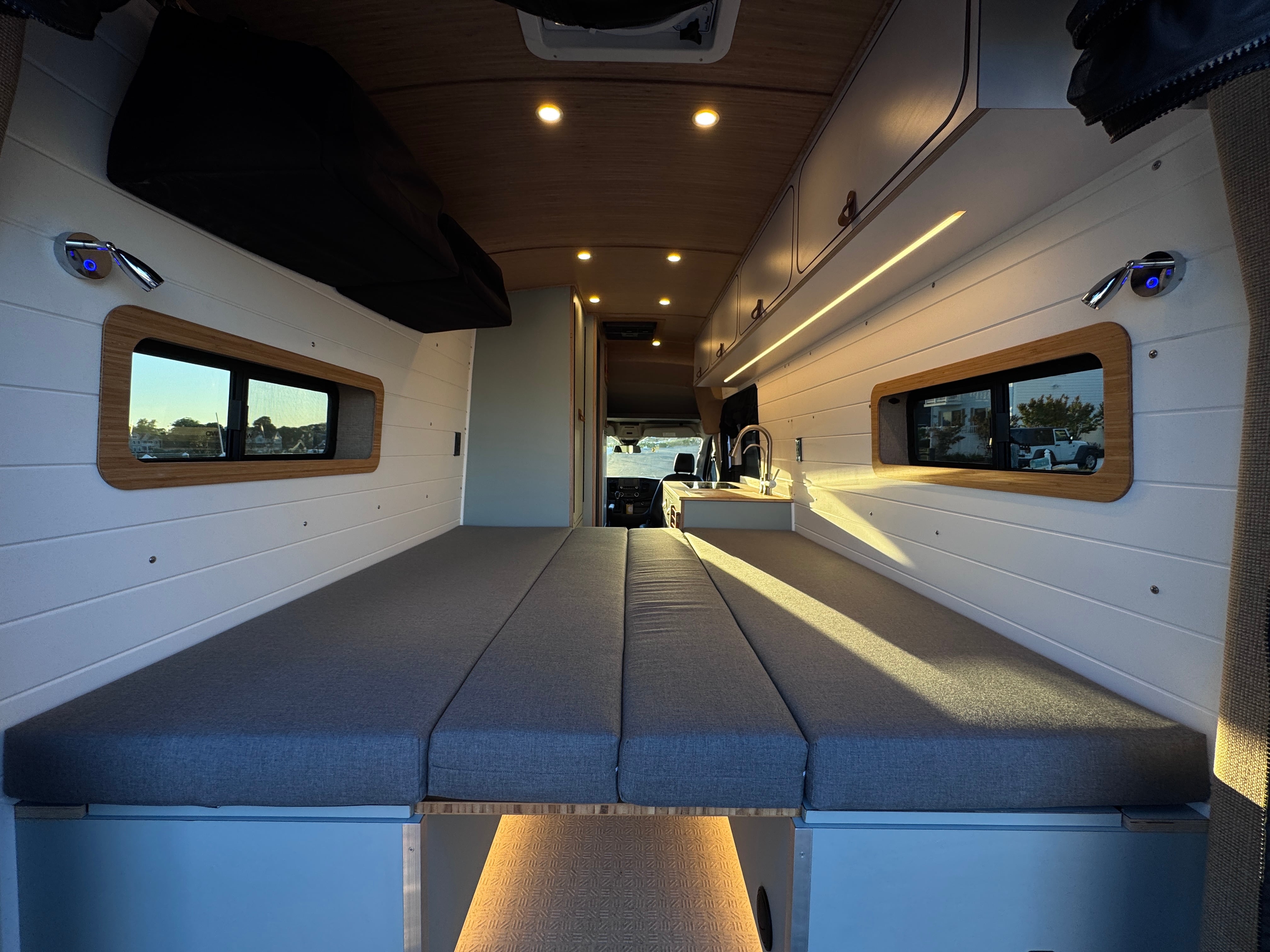 Camp Cruiser — Ford Transit 148 Extended, galley and lounge interior