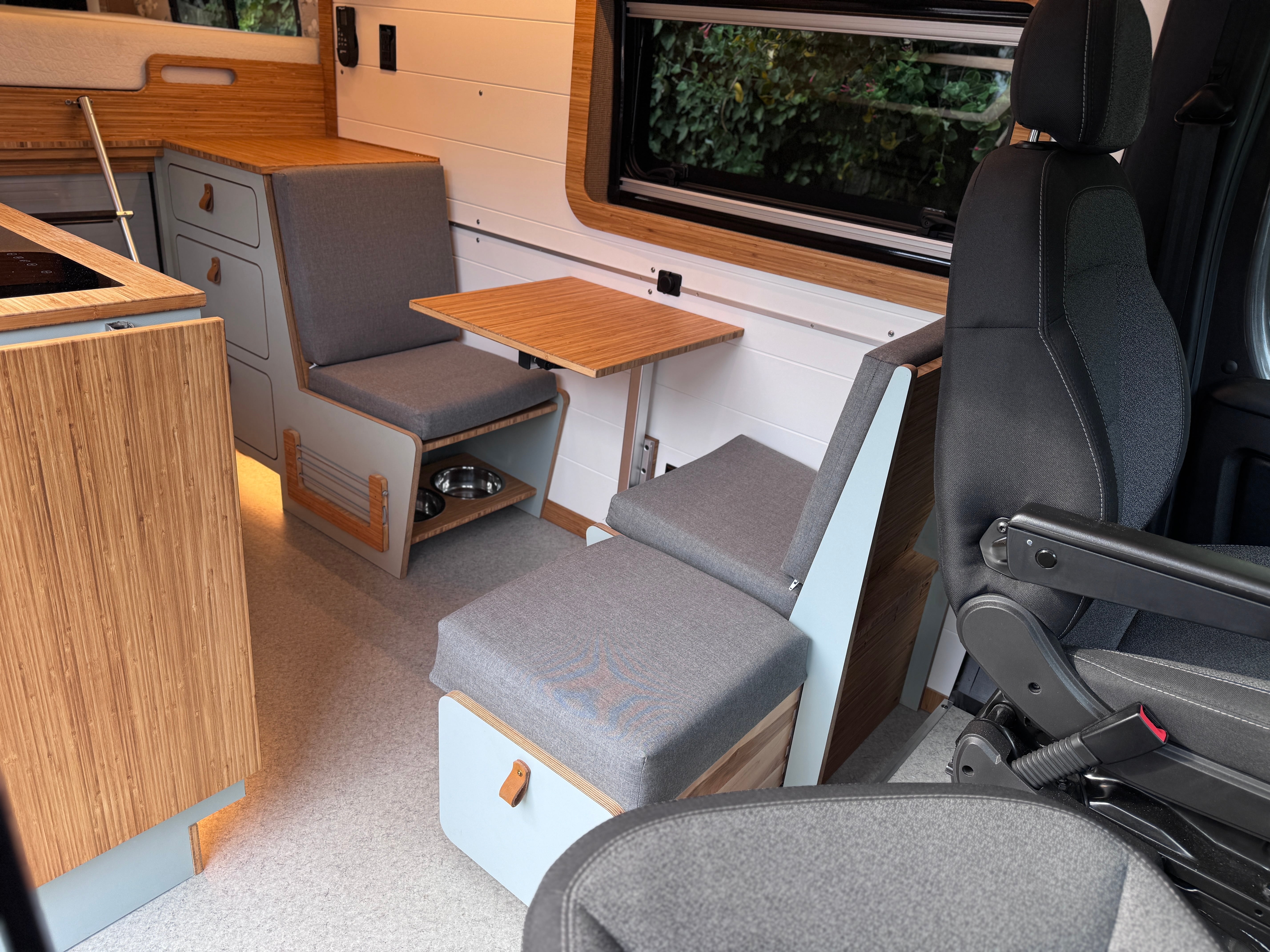 Eagles Nest — Ram ProMaster 159 Extended extra-high-roof, dinette and galley interior