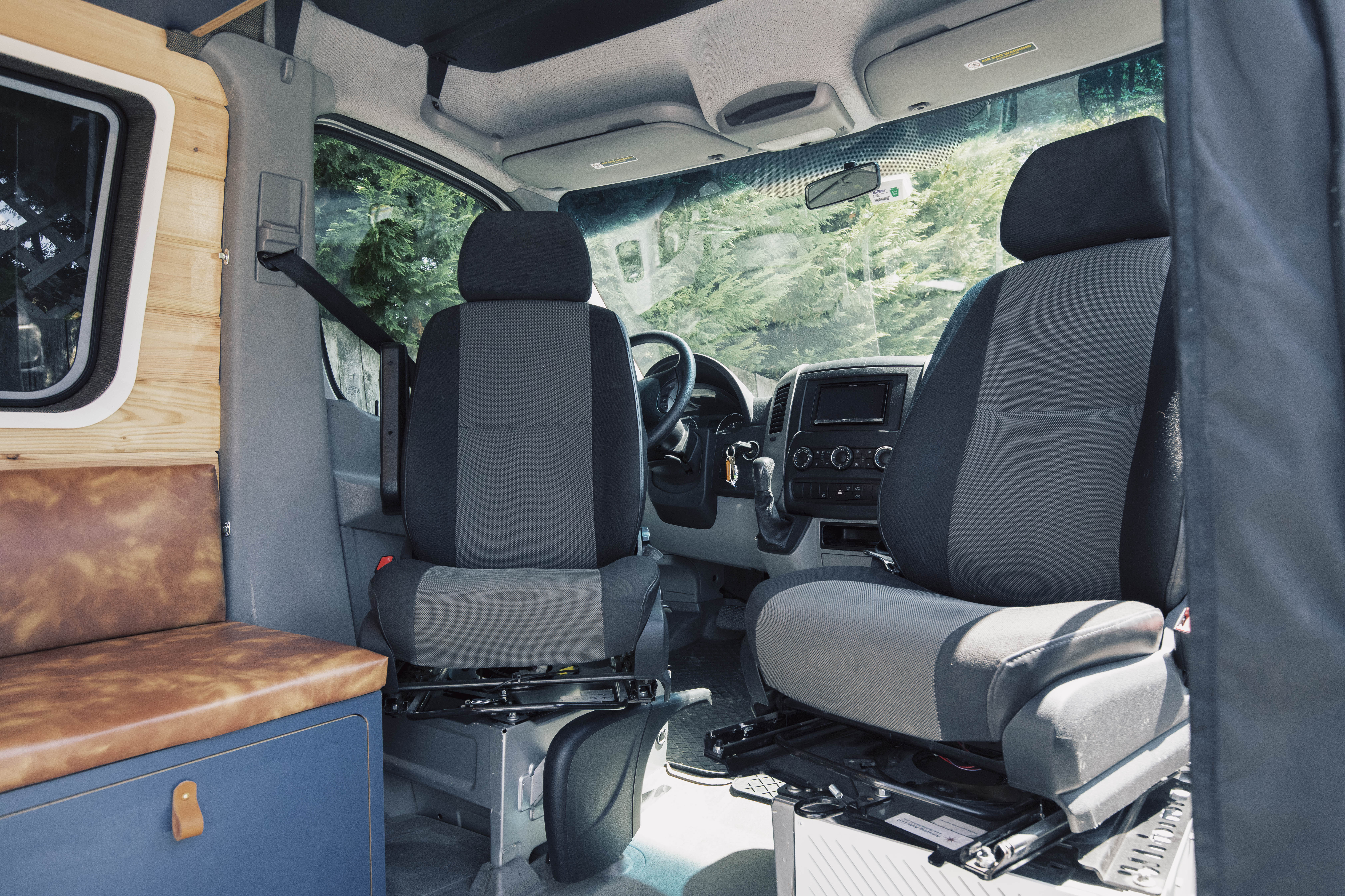 Frankenvan — custom Sprinter 170 4x4 interior showing dinette, galley, and mid-partition floorplan