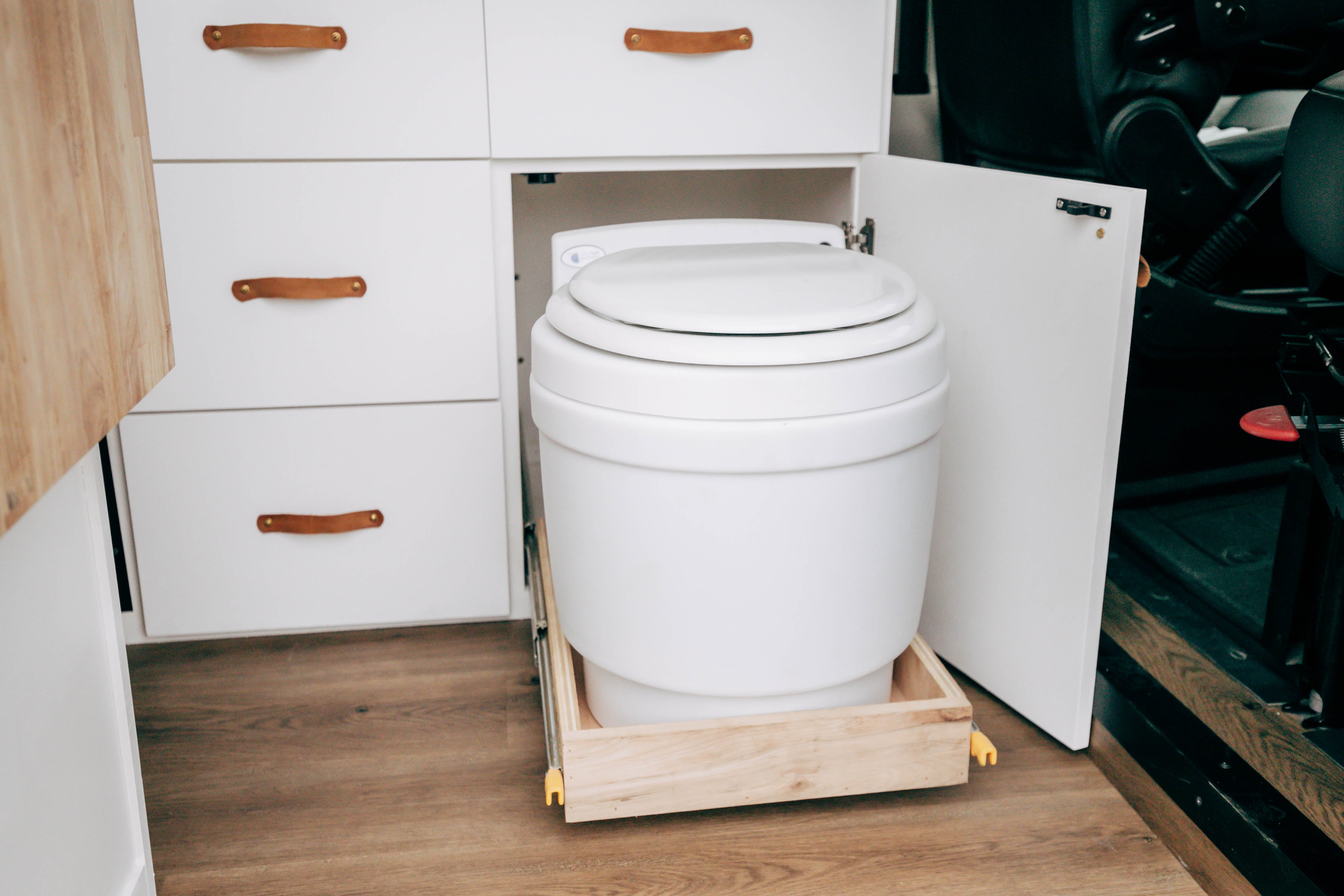 Riverside ProMaster 159 campervan slide-out cassette toilet in a white cabinet