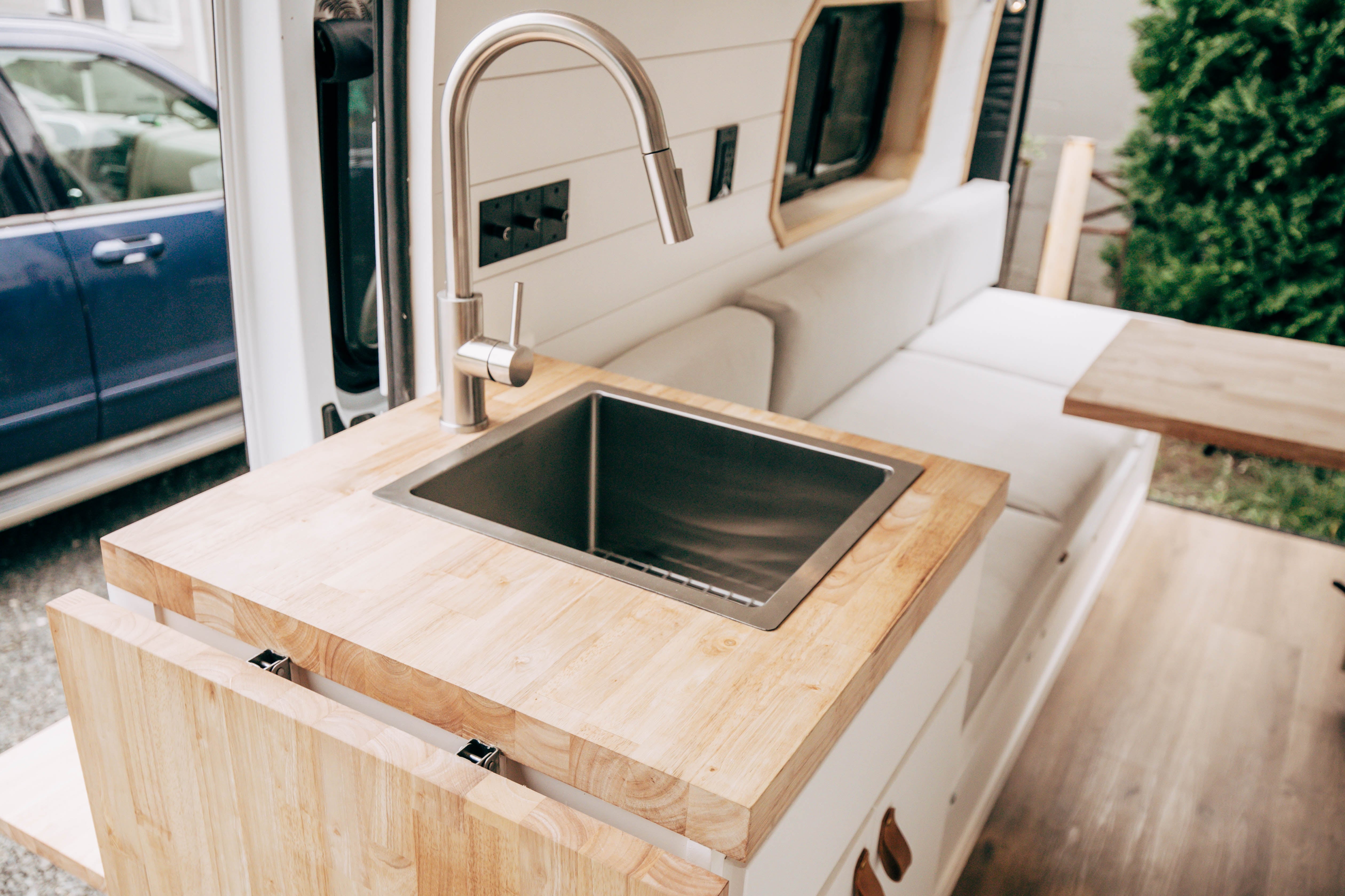Riverside ProMaster 159 campervan undermount stainless sink set in a butcher-block counter