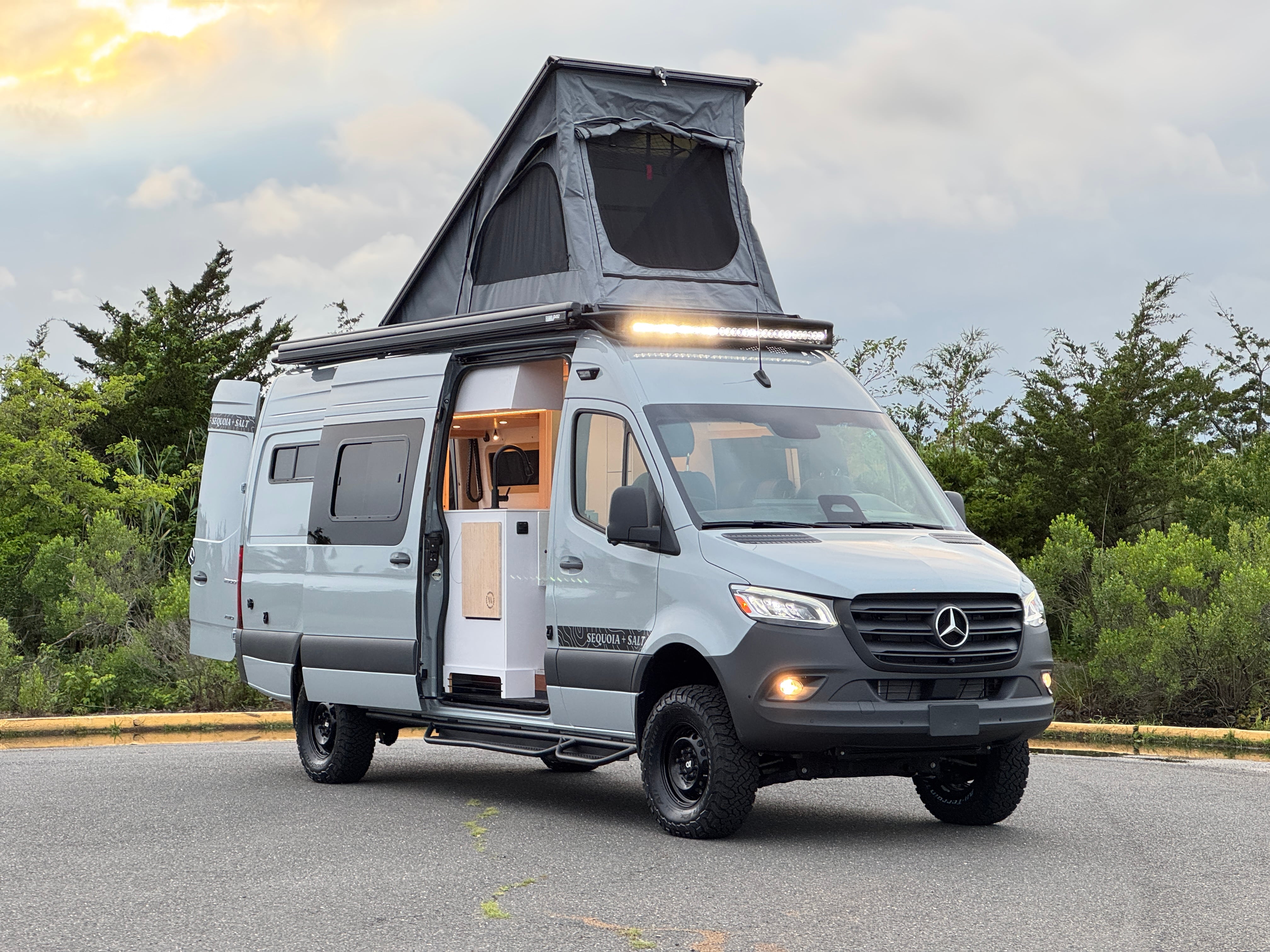 Skyrise Sprinter 170 campervan with pop-top penthouse roof extended, front three-quarter view