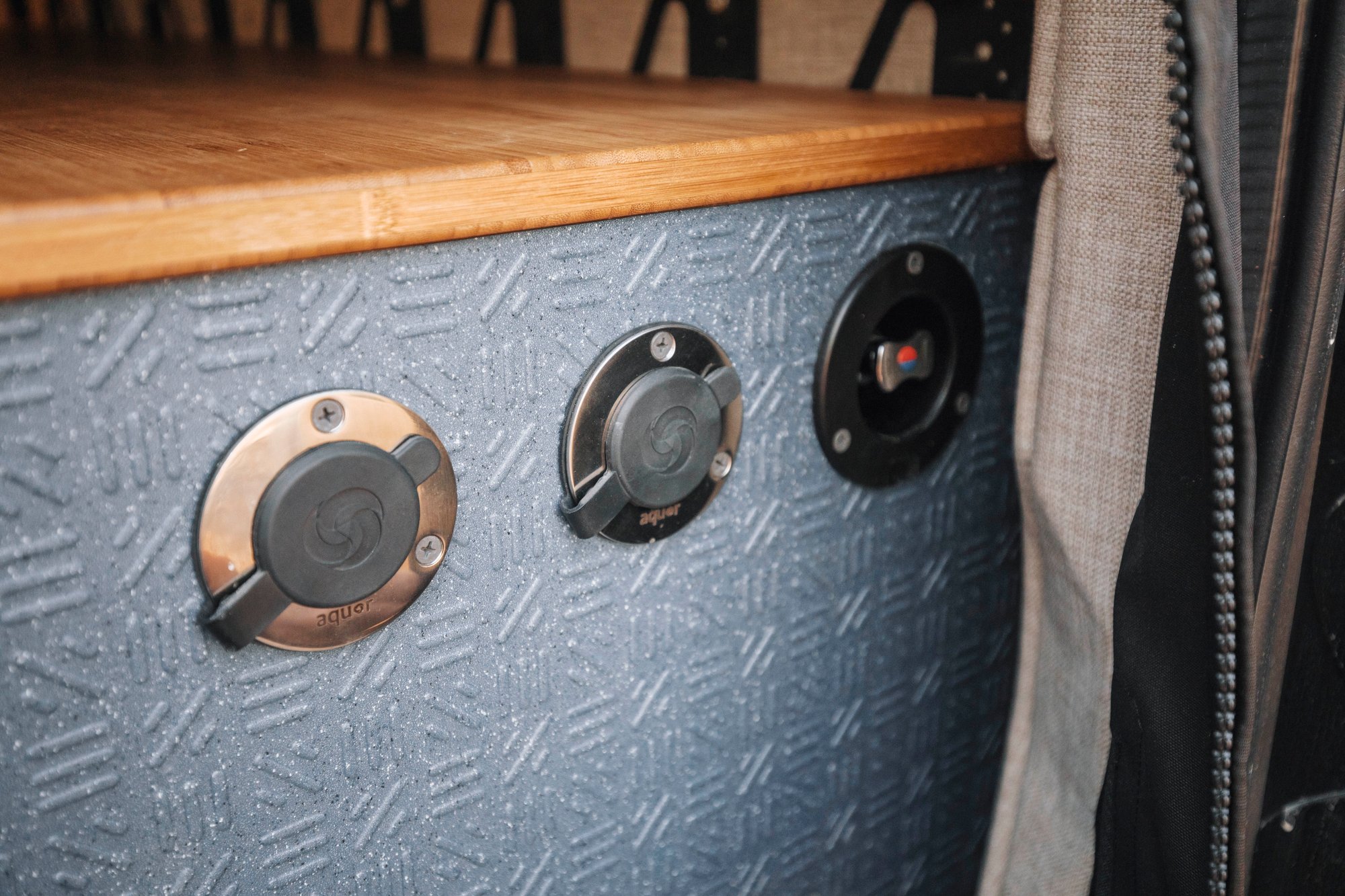 The Stoke — Aquor exterior water-fill ports on the rugged textured cabinet side