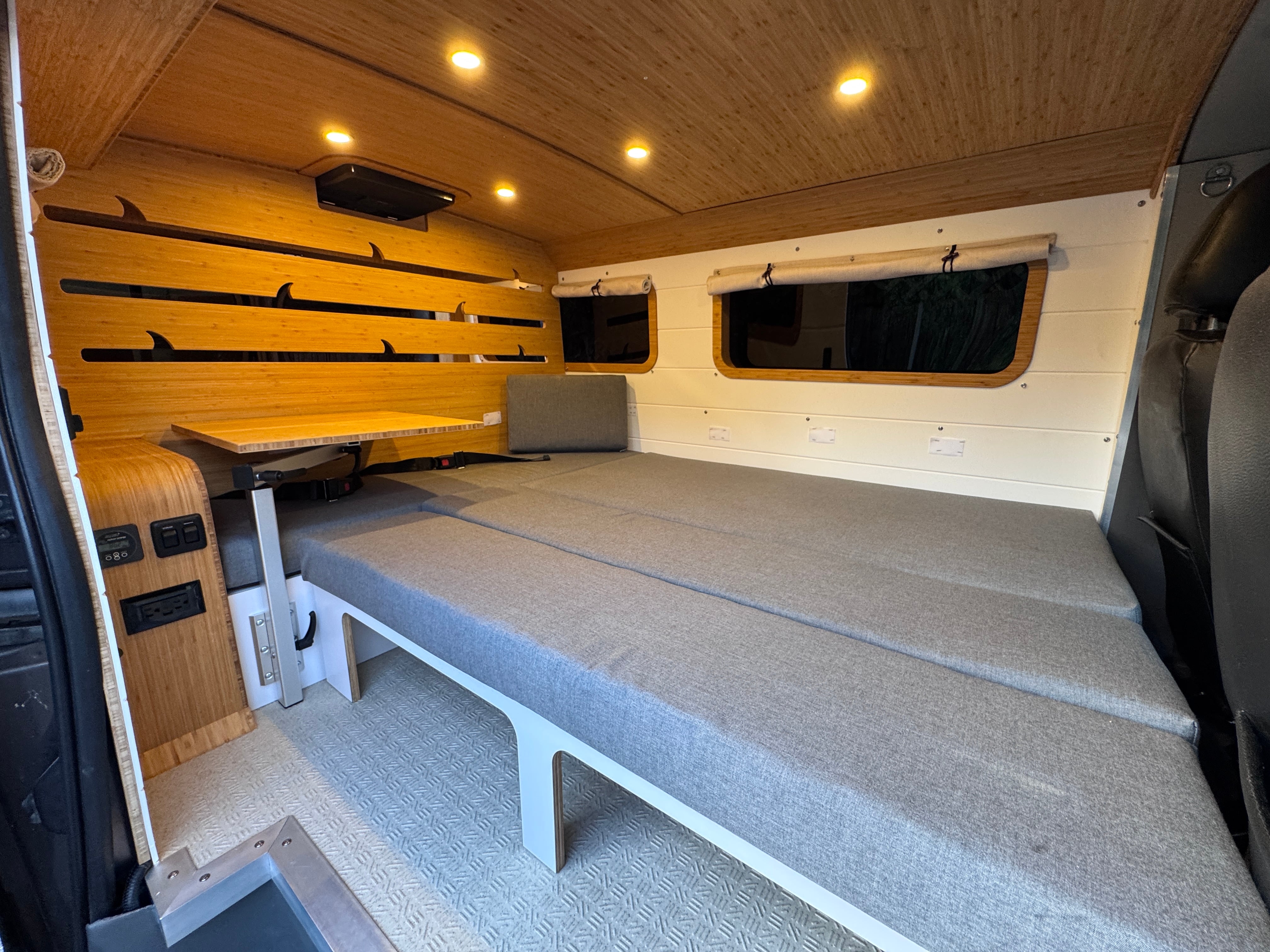 Zen Den — custom Nissan NV overland camper, cedar-lined interior