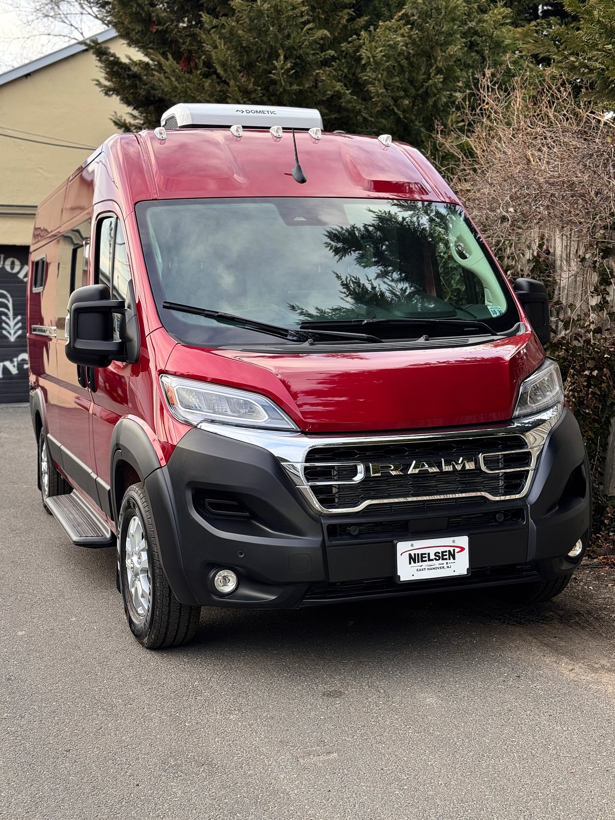 Bobal Mobile Salon — red ProMaster mobile salon exterior