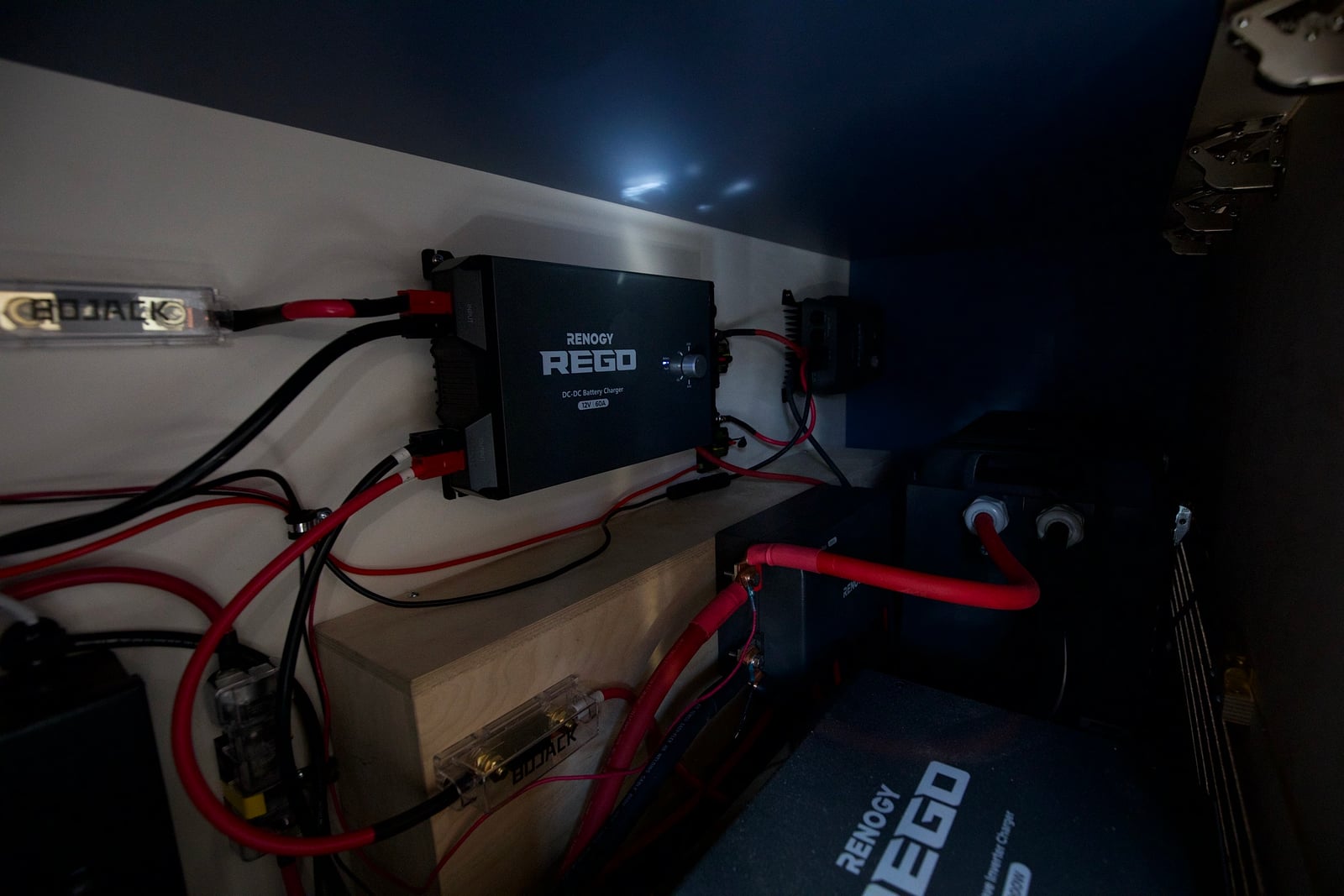 Northampton DCC electric Transit fleet — house power bay with DC-DC charger, inverter, and battery wiring