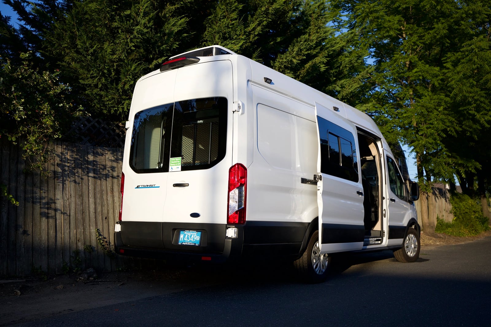 Northampton DCC electric Transit fleet — white Ford E-Transit 148 EXT, rear three-quarter with doors open