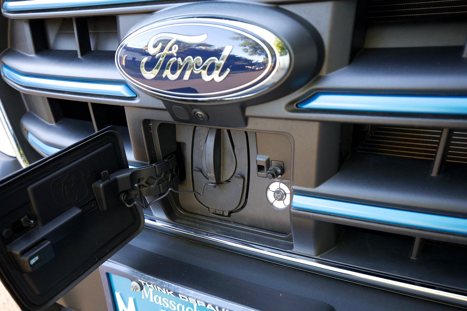 Northampton DCC electric Transit fleet — Ford E-Transit front grille with the EV charge port open