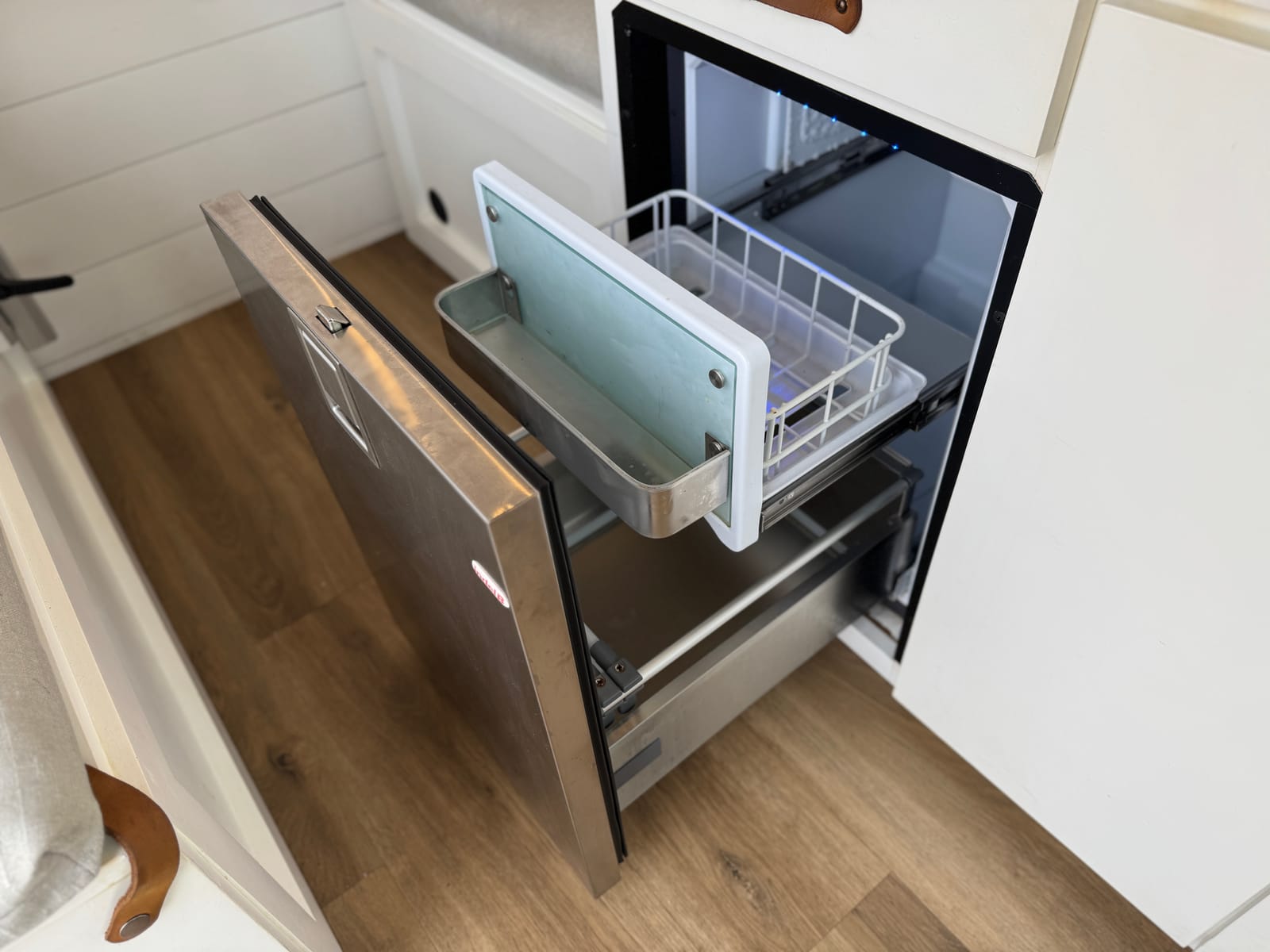Marine drawer refrigerator pulled open below the galley counter