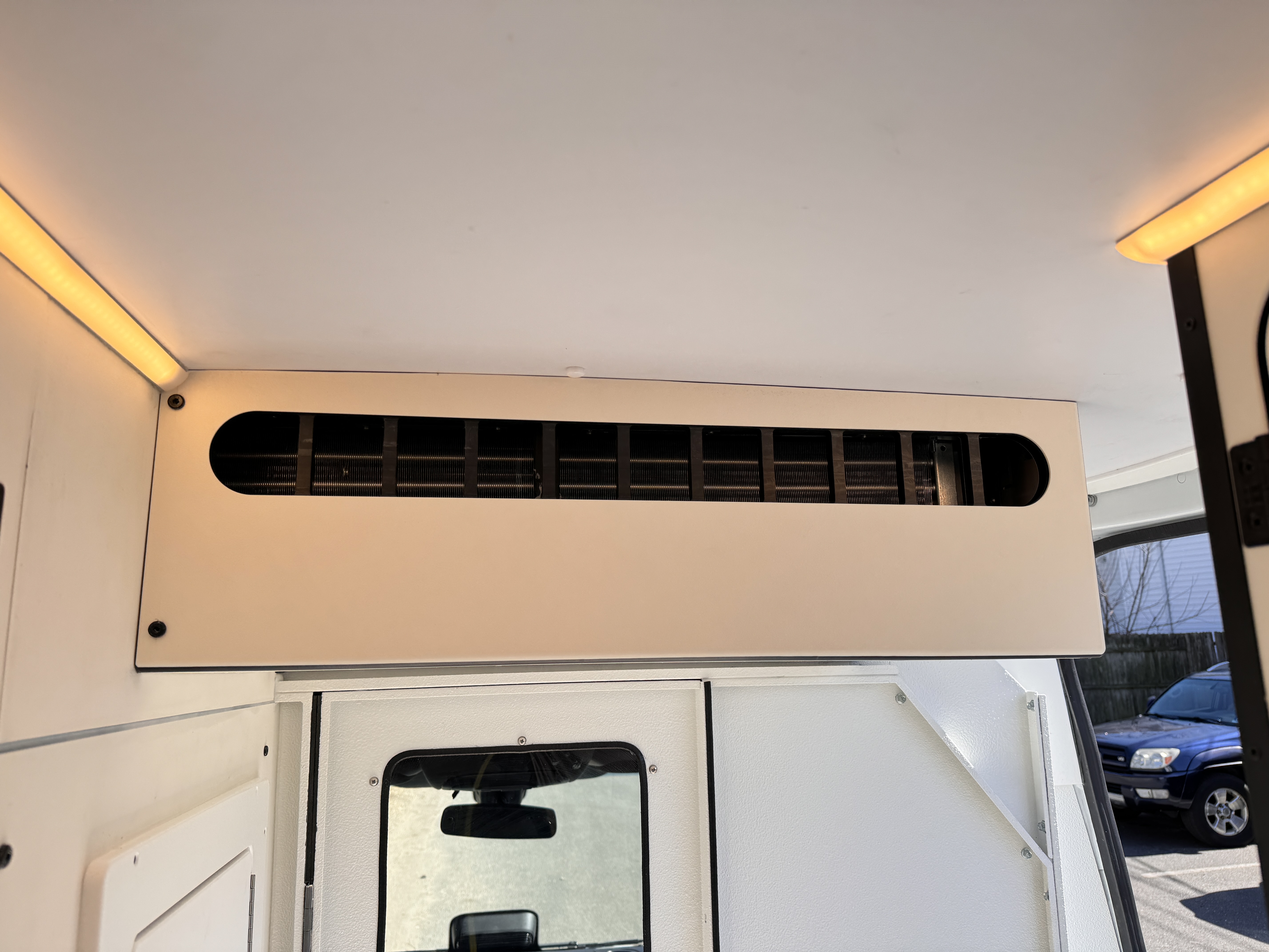 K9 transport Sprinter — overhead HVAC vent for kennel climate control