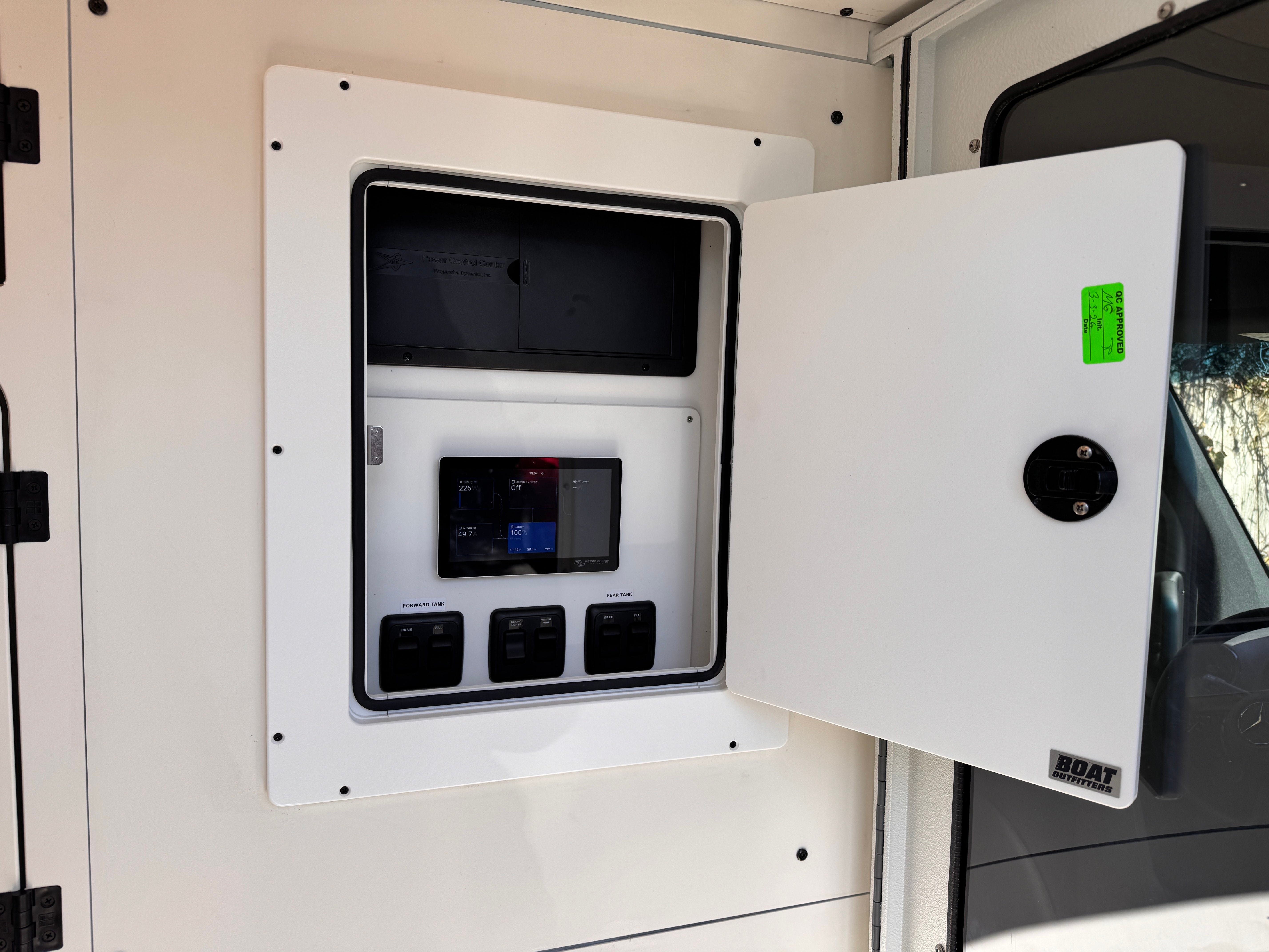 K9 transport Sprinter — Victron power control center with live monitoring at the handler-facing wall