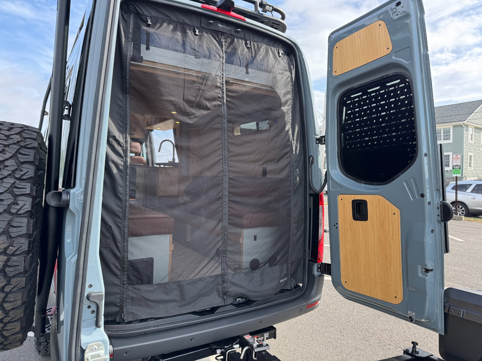 Sprinter rear doors with screen — placeholder for Drift Wood rear lounge opening