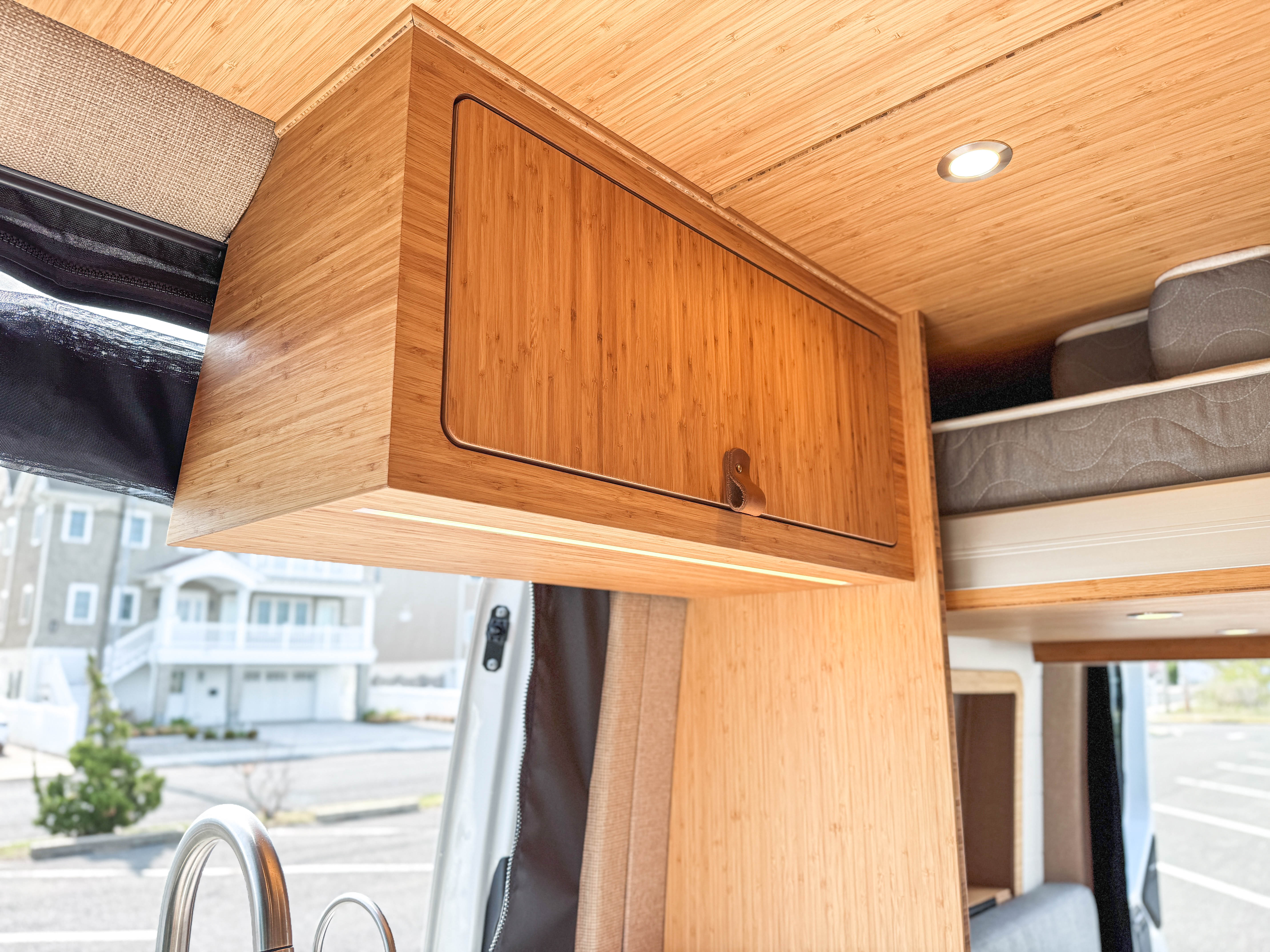 Isotherm marine dual-drawer refrigerator open in a Loft campervan — the kind of premium component that defines all-in pricing