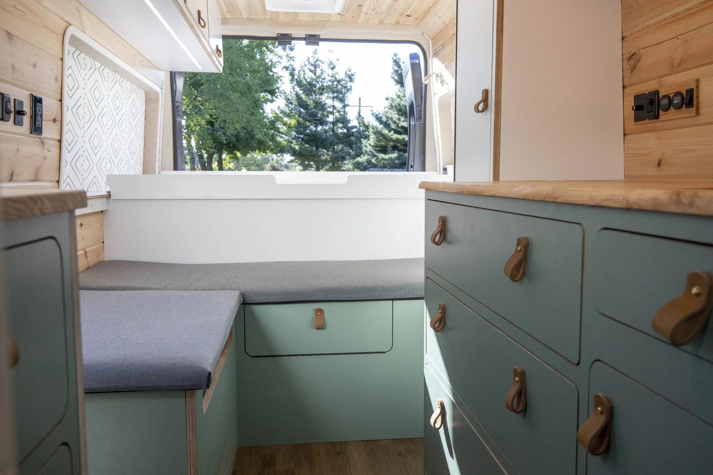 Sprinter campervan sage cabinetry and dinette
